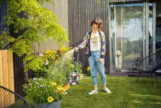 woman watering flowers